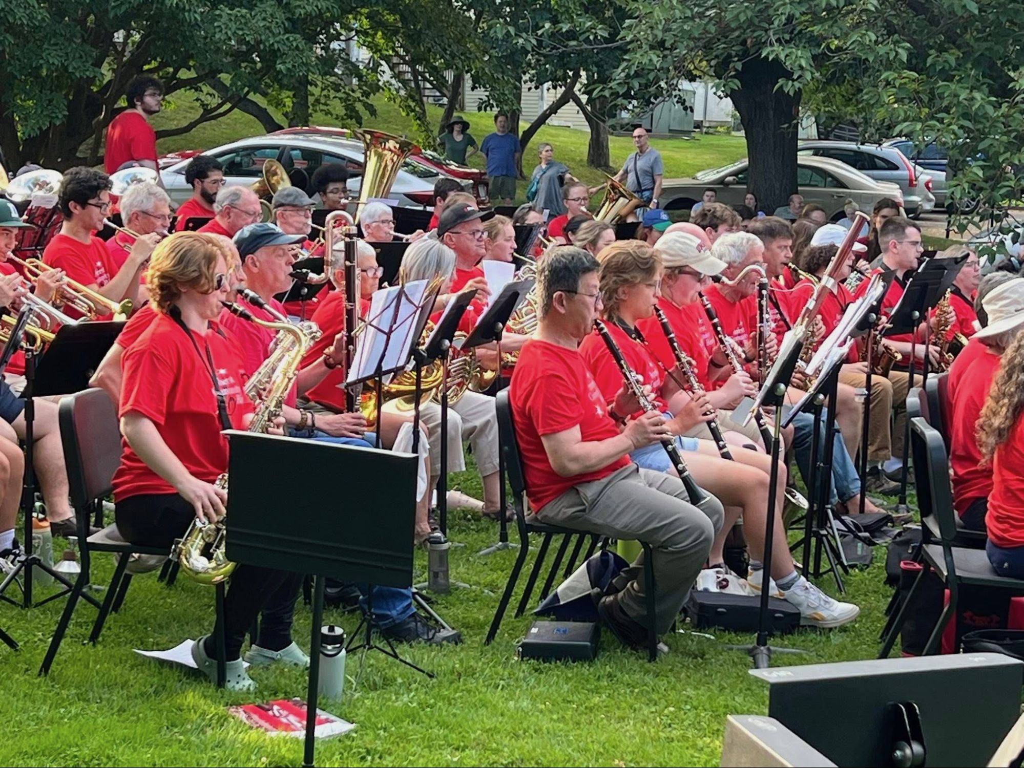 The whole band playing in the park